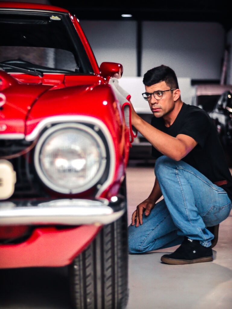 Man detailing car